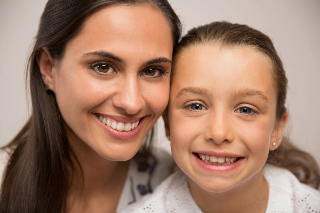 Shot of a beautiful Mother and Daughter smiling - Photo, Image