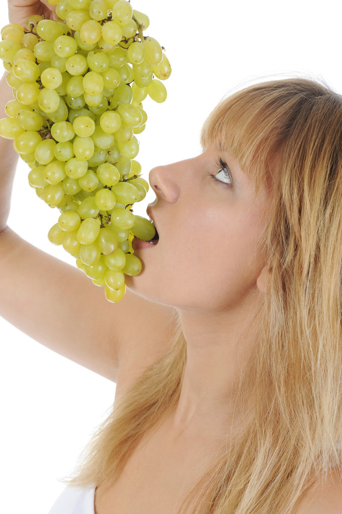 Mädchen isst Weintrauben - Foto, Bild