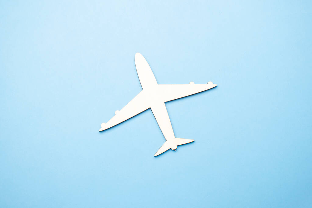 model of passenger plane on blue background - Photo, Image