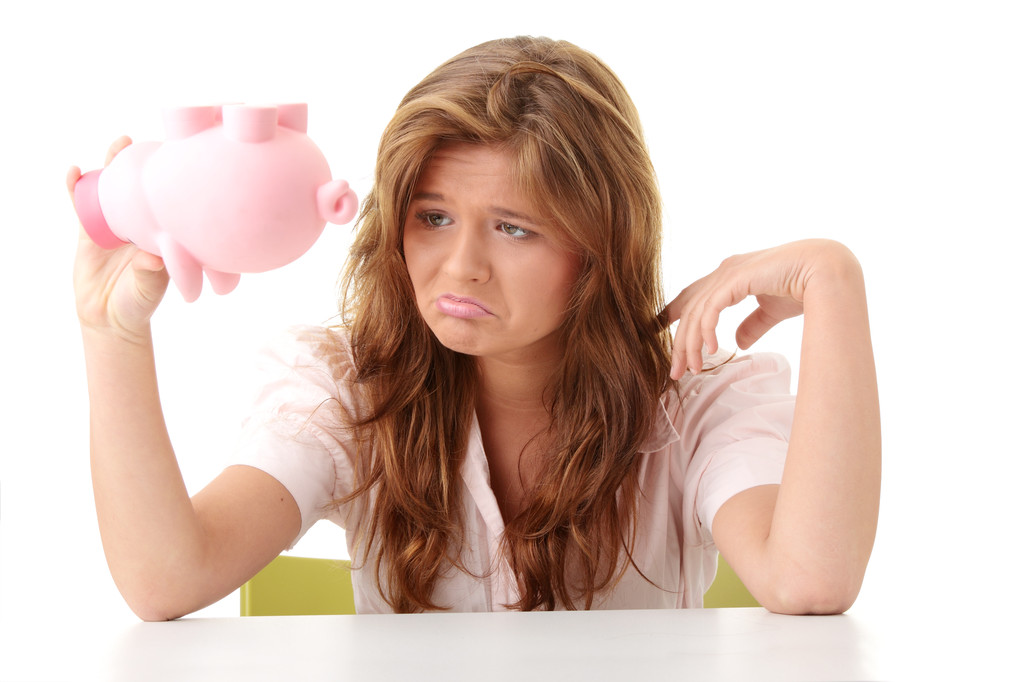 Woman and piggy bank - Foto, afbeelding