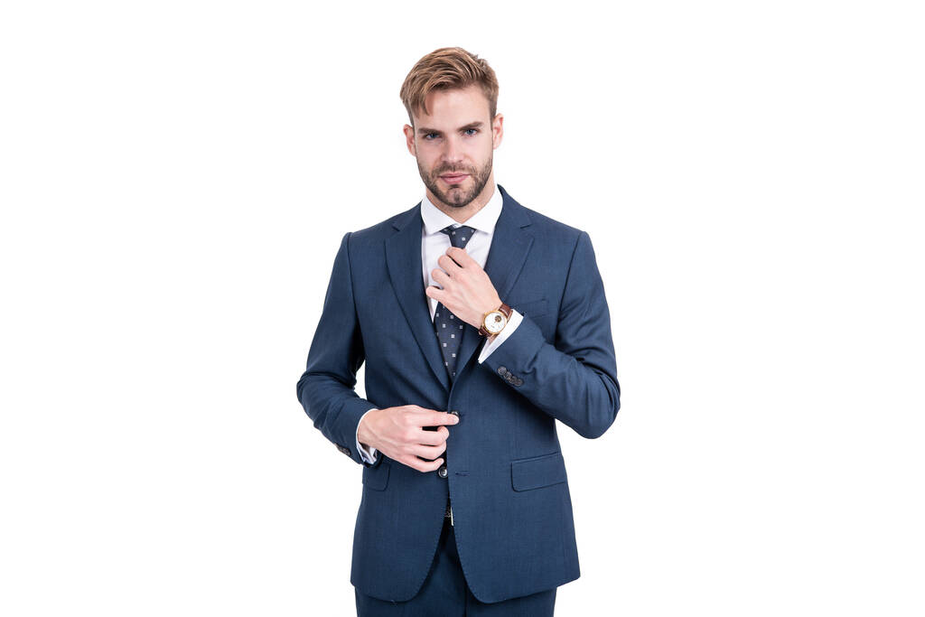 уверенный бизнесмен в деловом костюме и наручные часы изолированы на белом, совершенство. - Фото, изображение