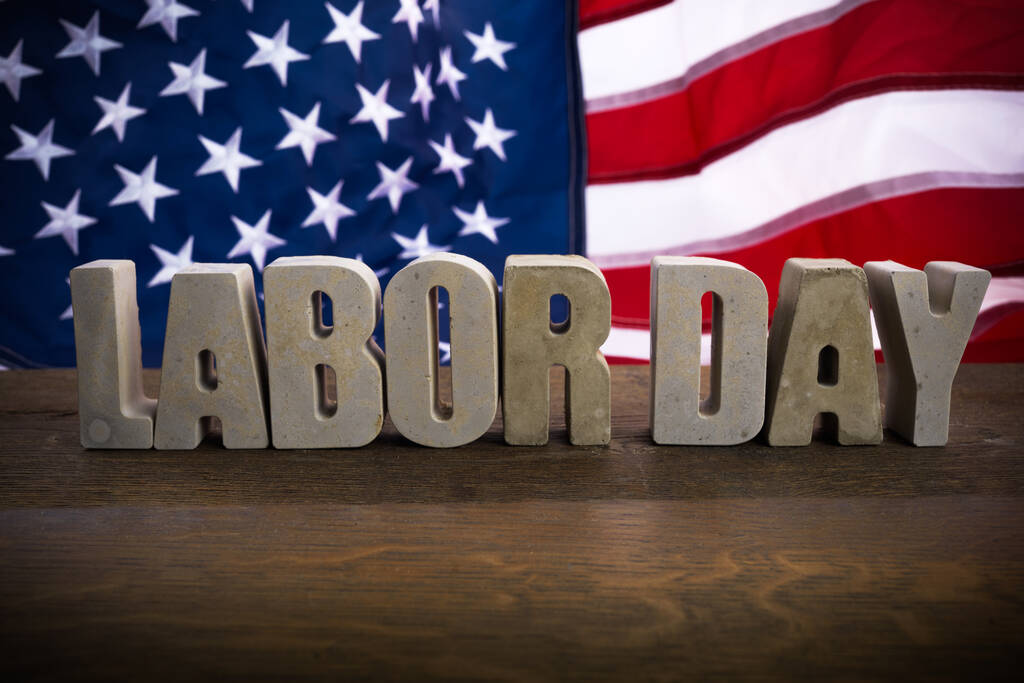 Happy Labor Day banner. USA flag and letters on rustic wooden background. - Photo, Image