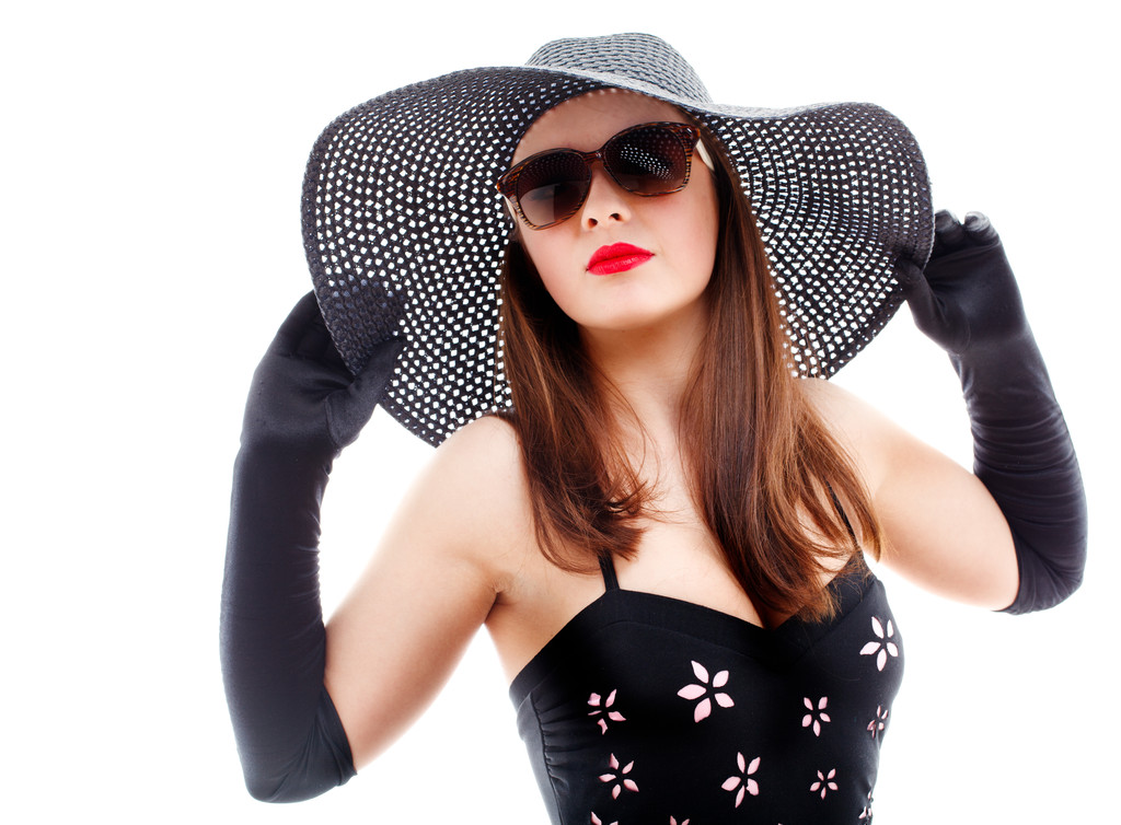 Nuori nainen musta hattu ja aurinkolasit
 - Valokuva, kuva