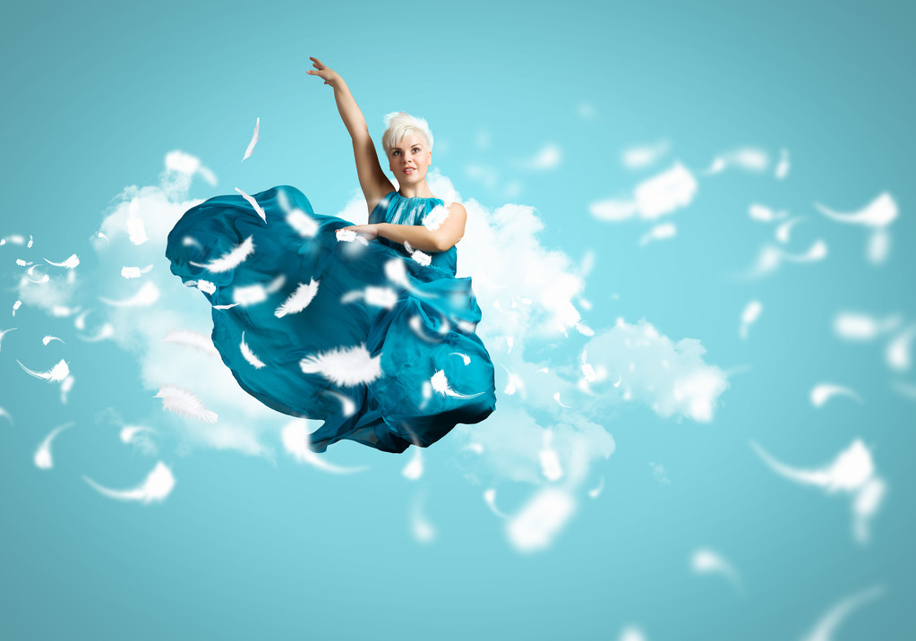 空気中の女性のダンス - 写真・画像