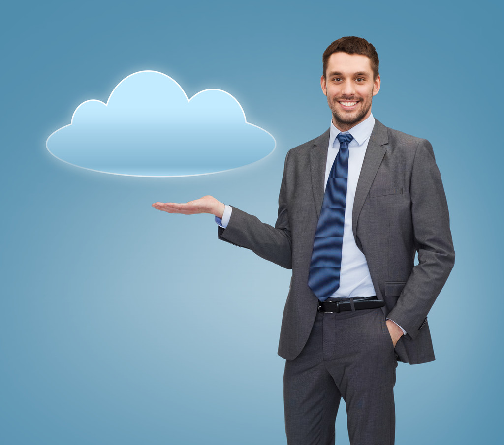 sonriente hombre de negocios sosteniendo icono de nube
 - Foto, Imagen