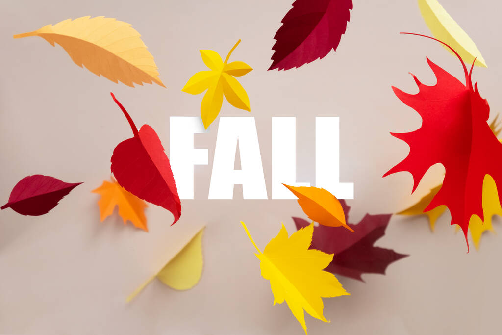 Lettering fall cut from paper with paper autumn leaves - Photo, Image
