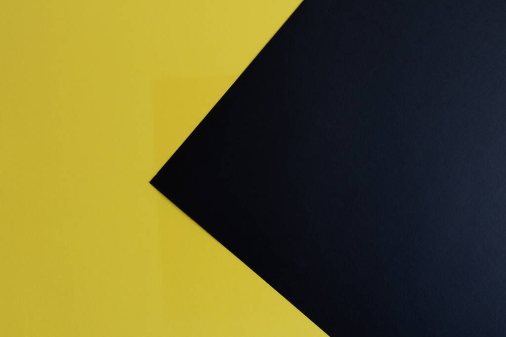 A closeup of a yellow and black surface with space for text - Photo, Image