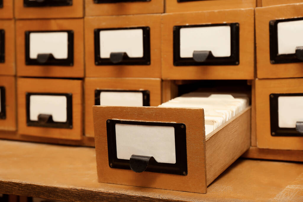 Closeup view of library card catalog drawers - Photo, Image