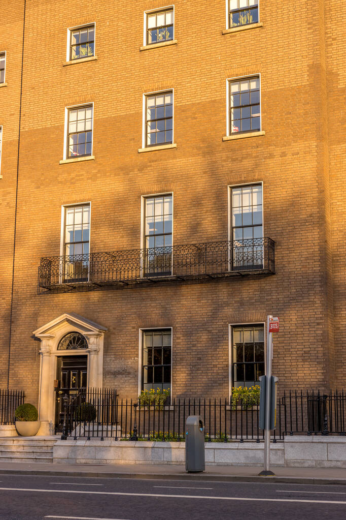 DUBLIN, IRELAND - Mar 17, 2021: Ireland, Dublin, a view of a building containing the Australian Embassy in the evening - Photo, Image