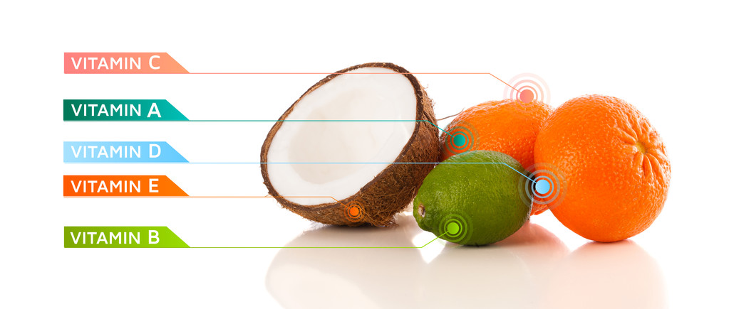 Gezond fruit met kleurrijke vitaminesymbolen en iconen - Foto, afbeelding