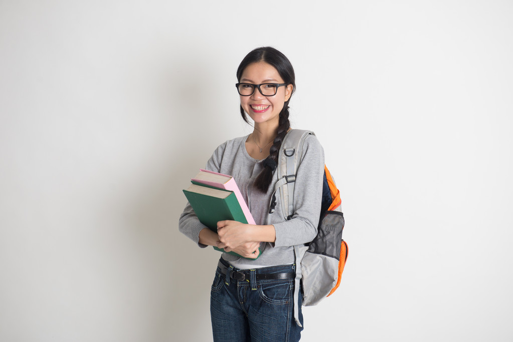 Asijská studentka držící knihu - Fotografie, Obrázek