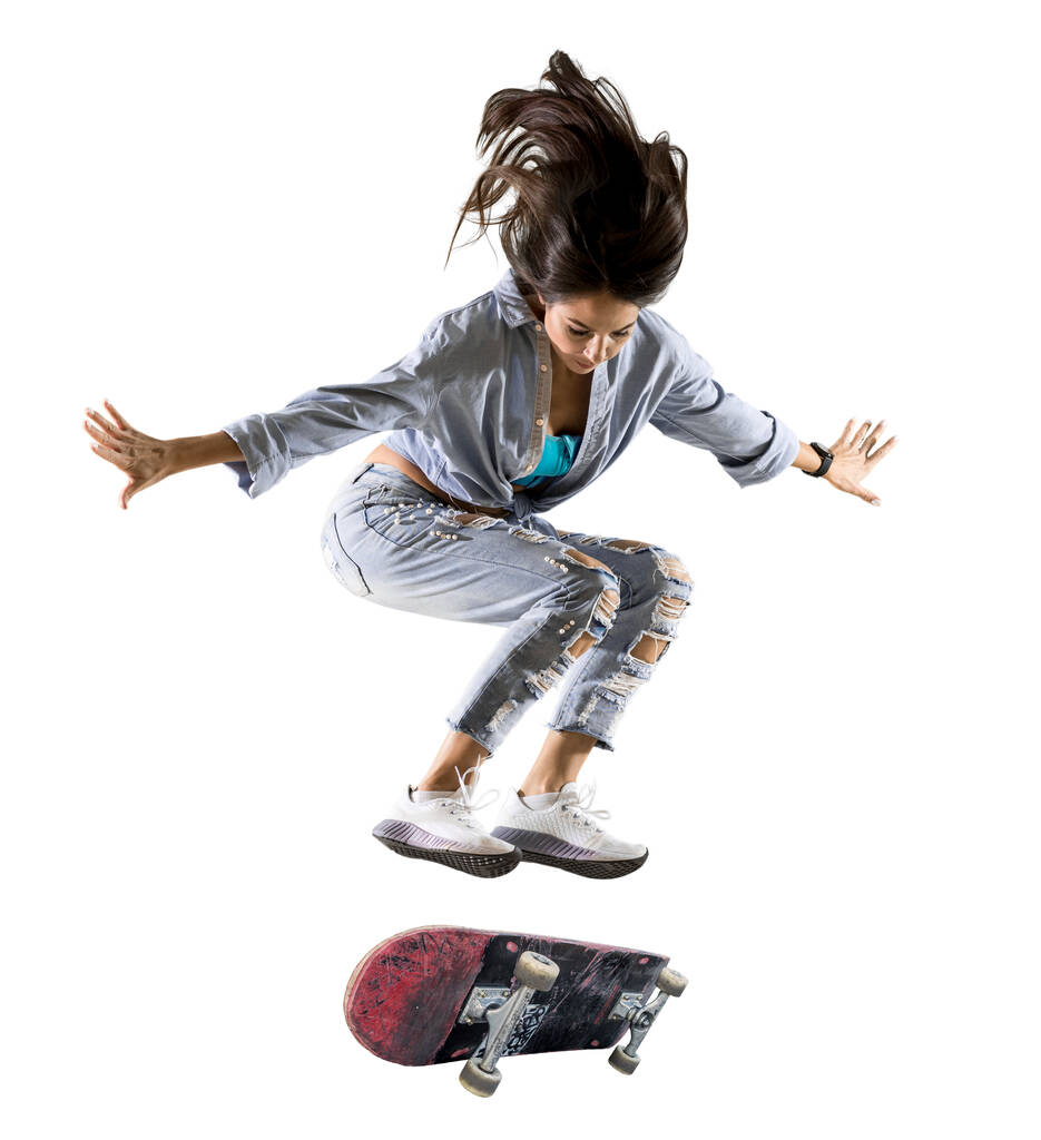 Skateboarder doing a jumping trick. Freestyle extreme sports concept isolated on white background - Photo, Image