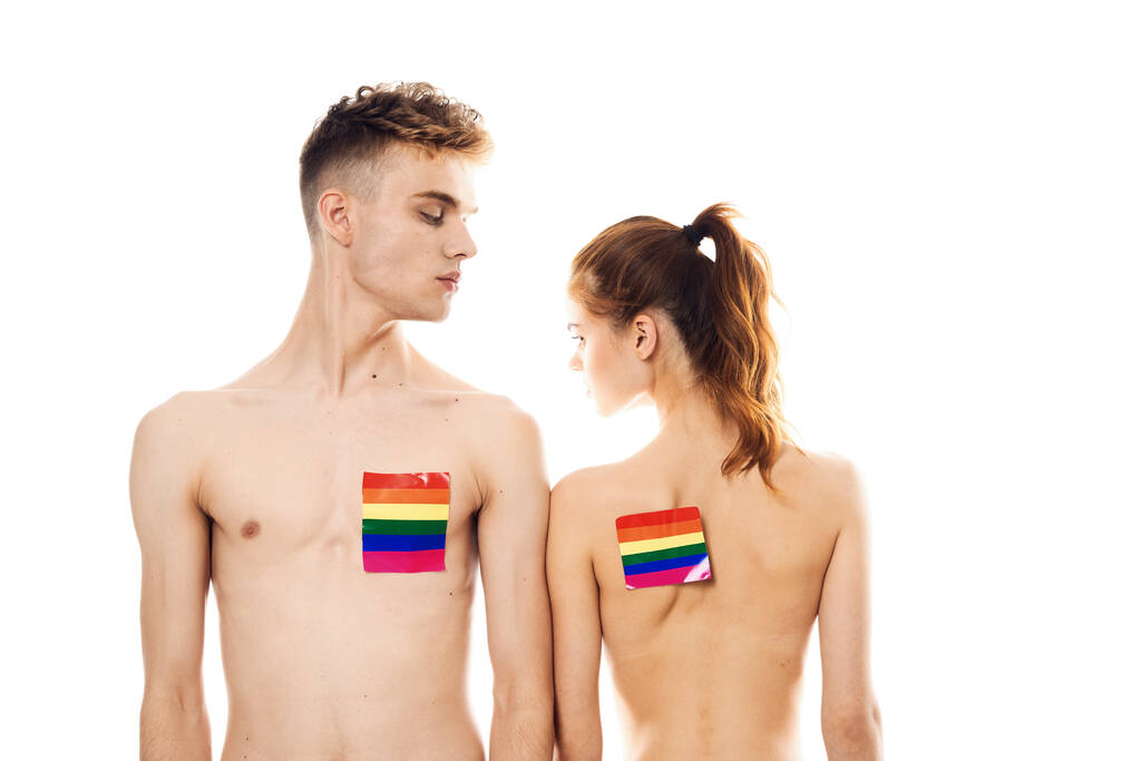joven pareja lgbt bandera transgénero estilo de vida luz fondo - Foto, imagen