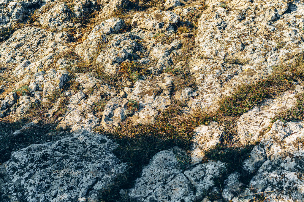 Φωτογραφία από την κοιλάδα του βουνού φόντο πέτρινο τοπίο - Φωτογραφία, εικόνα