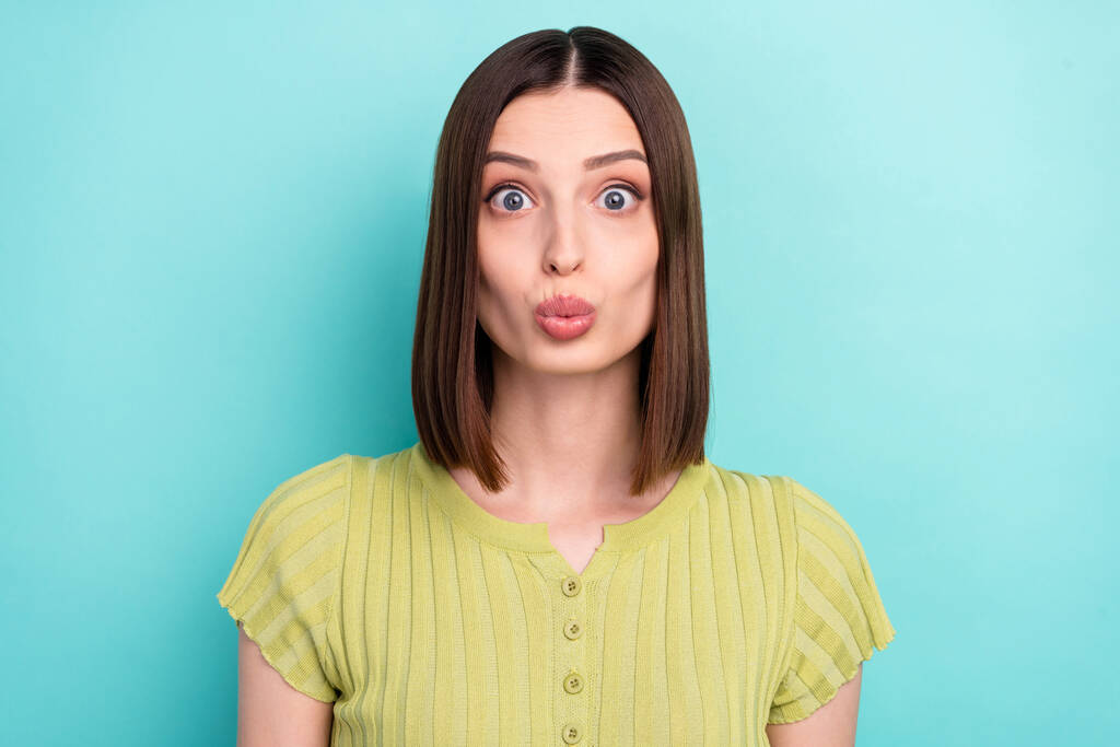 Photo of romantic girlfriend lady excited face send love air kiss wear green blouse isolated turquoise color background - Photo, Image