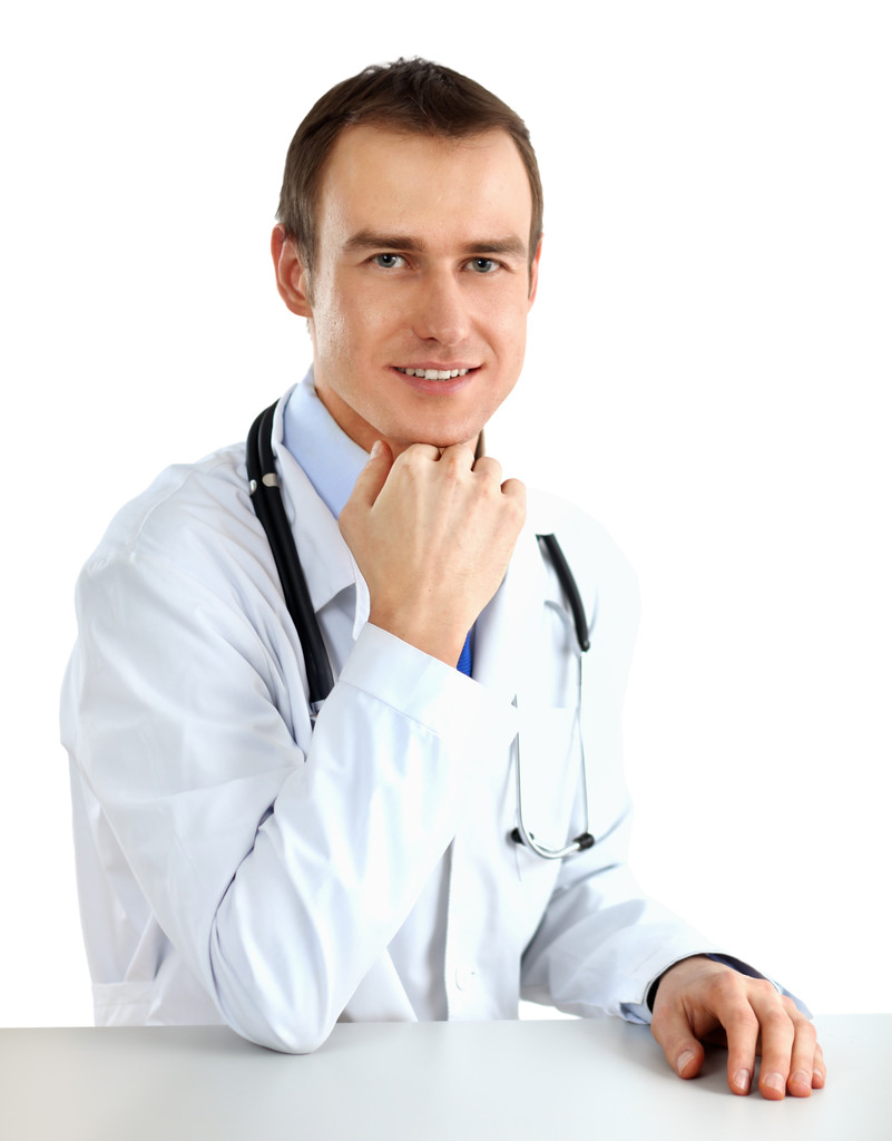 Ritratto di un medico seduto alla scrivania su sfondo bianco
 - Foto, immagini