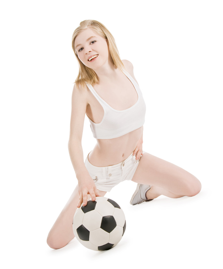 jasný obrázek sexy ženy s fotbalovým míčem přes bílý - Fotografie, Obrázek