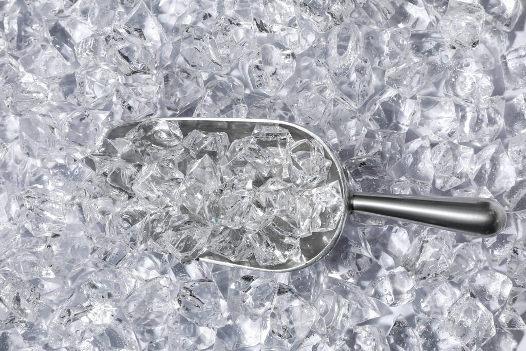 Metal scoop on crushed ice, top view - Photo, Image
