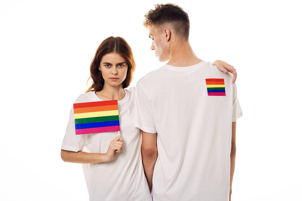 joven pareja lgbt bandera de la comunidad transgénero estilo de vida - Foto, Imagen