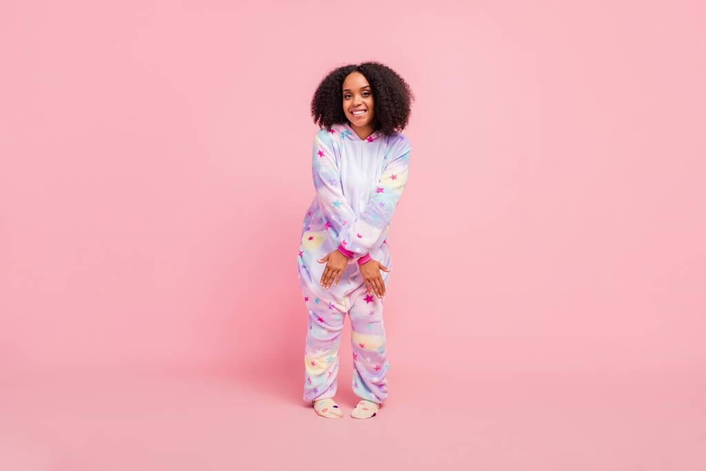 Full length photo of youth cheerful african lady good mood disco wear warm overall isolated over pink color background. - Photo, Image