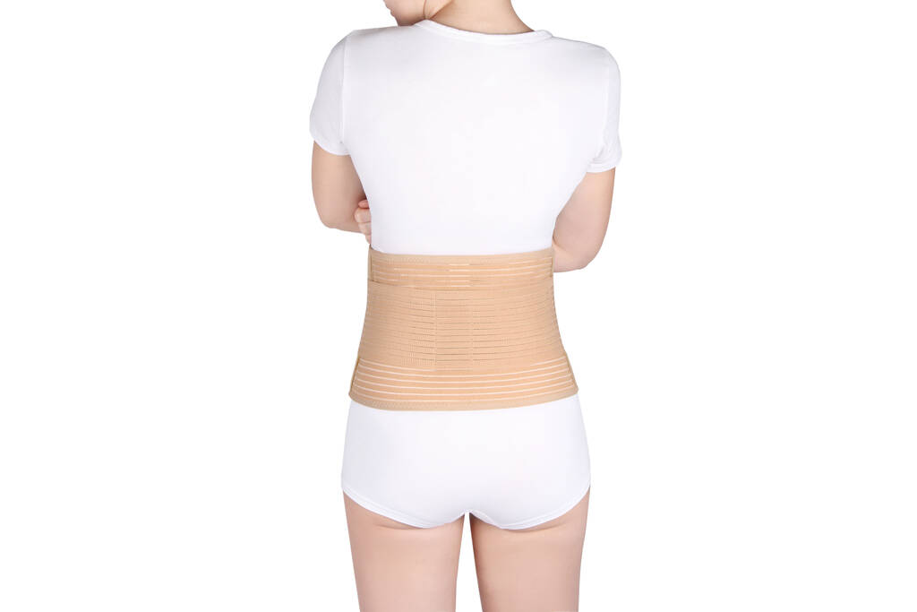 Orthopedic lumbar support corset products. Lumbar Support Belts. Posture Corrector For Back Clavicle Spine. Lumbar Waist Support Belt Strong Lower Back Brace Support - Photo, Image