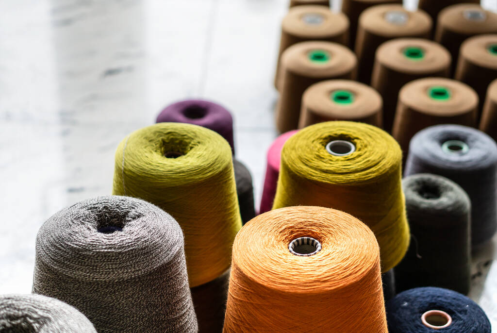 Many multi-colored bobbins of yarn. Knitting. - Photo, Image