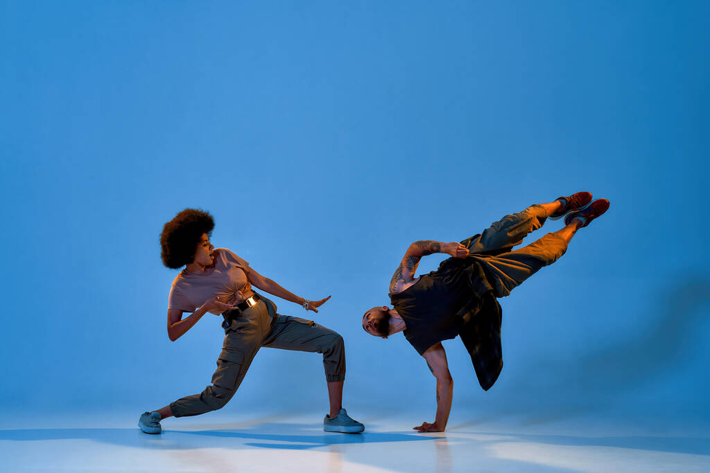 Multiracial dance couple dancing hip hop dance - Photo, Image