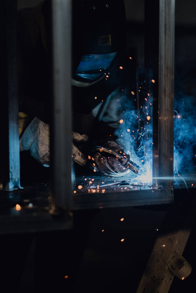 A closeup of a man welding - Photo, Image