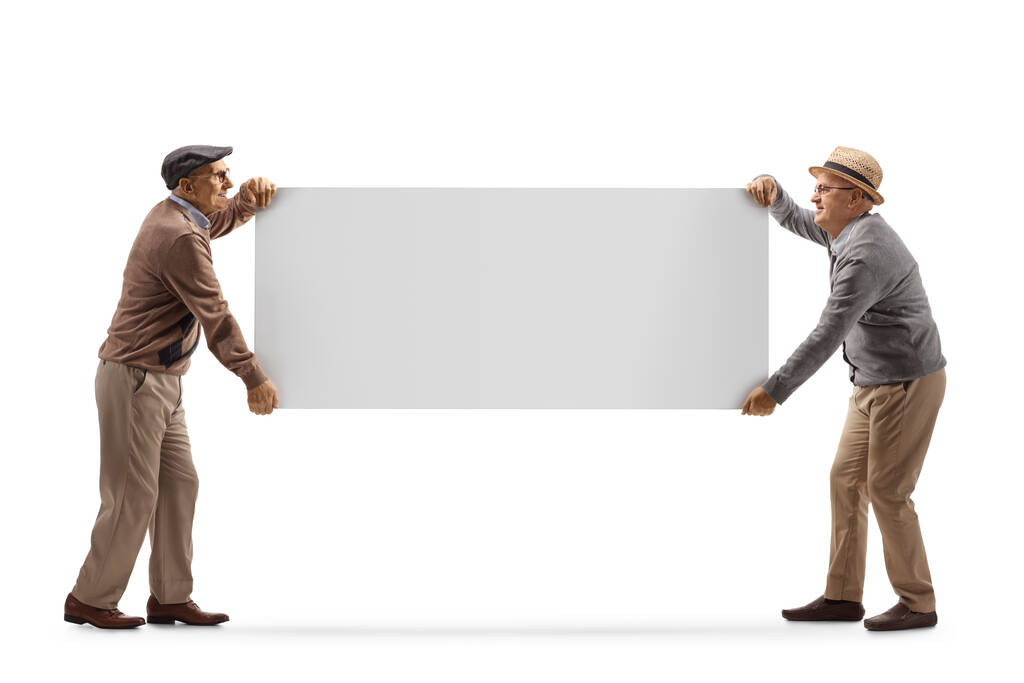Полнометражный снимок двух пожилых мужчин с пустой панелью на белом фоне - Фото, изображение
