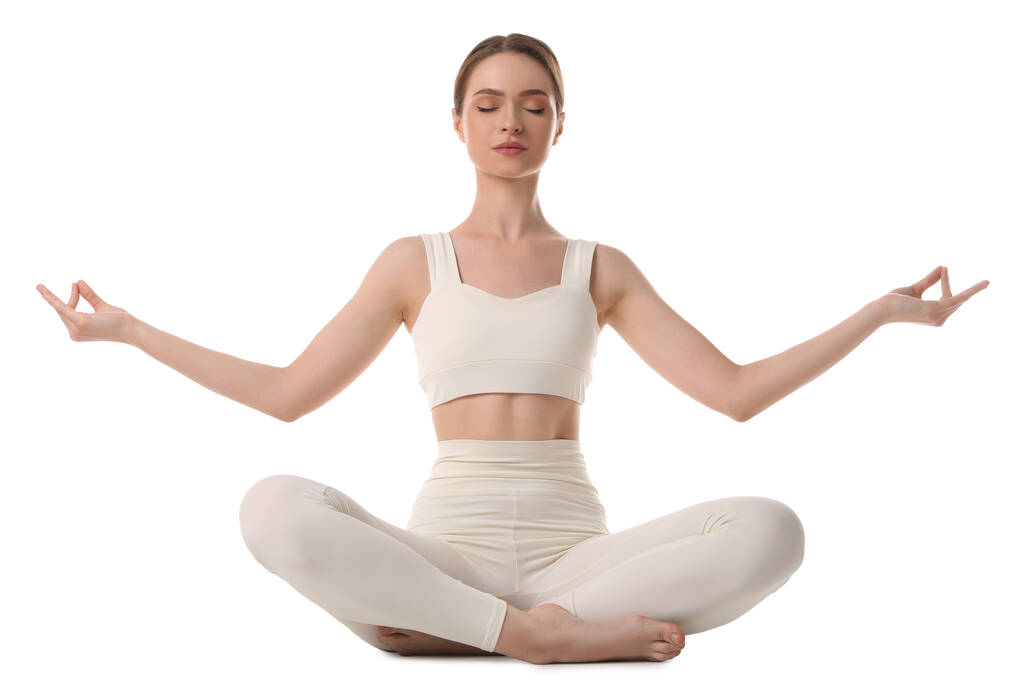 Bella giovane donna meditando su sfondo bianco - Foto, immagini