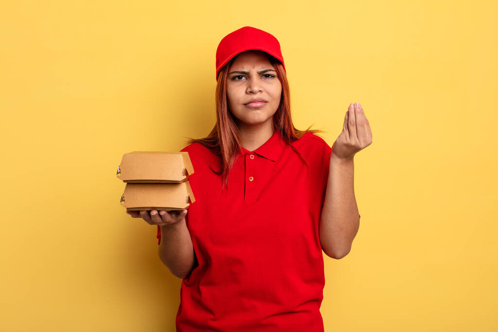 hispanic woman making capice or money gesture, telling you to pay. take away deliver concept - Photo, Image