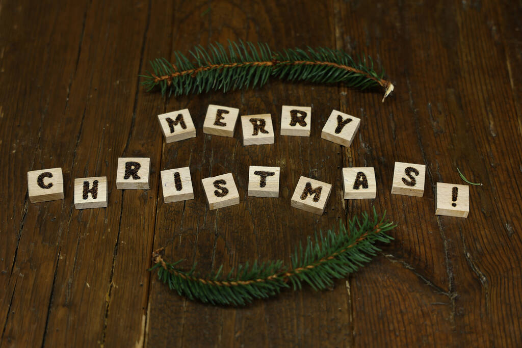 Счастливого Рождества, написанного деревянными блоками. - Фото, изображение