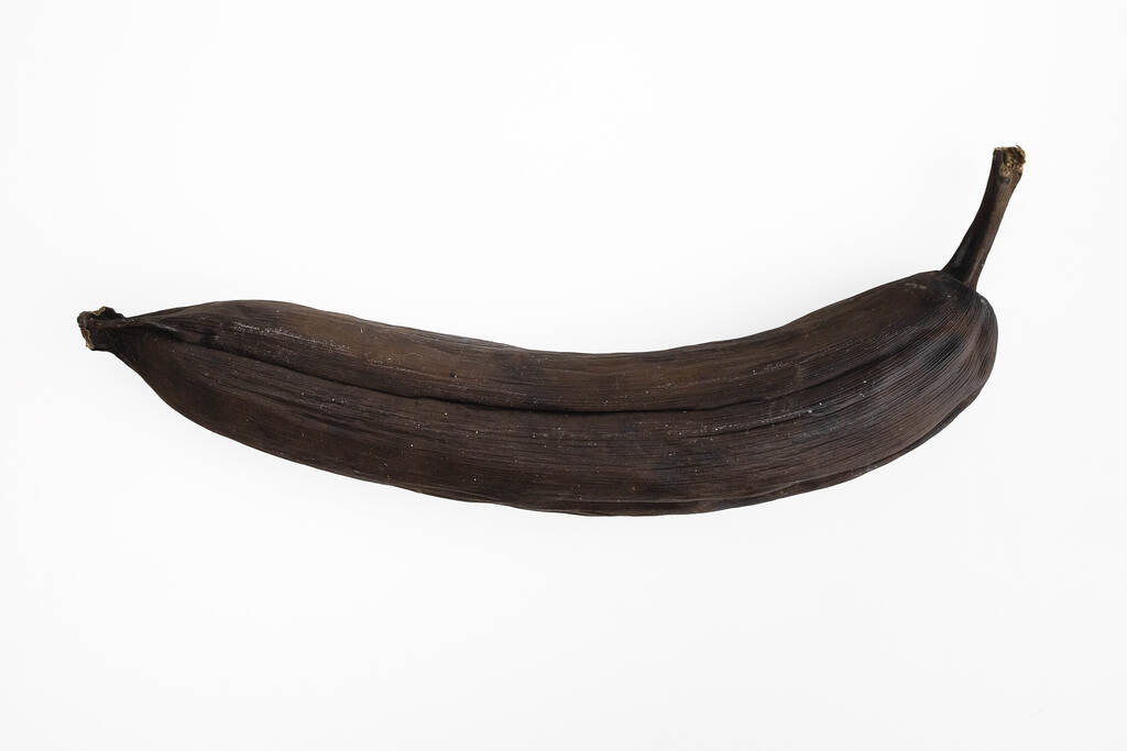 Rotten black banana isolated on white background - Zdjęcie, obraz