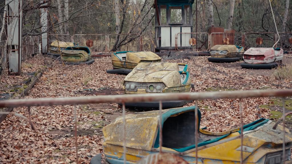 old damaged cars in amusement park of chernobyl city - Photo, Image