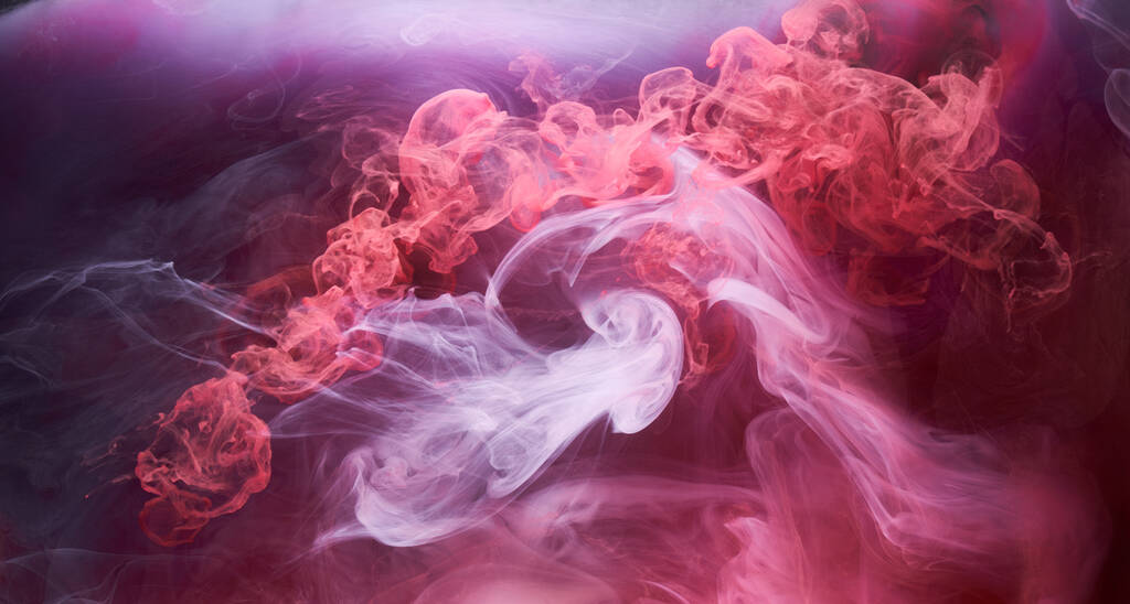 黒インクの背景にピンクの煙、カラフルな霧、抽象的な渦巻くタッチ海、アクリル絵具顔料水中 - 写真・画像