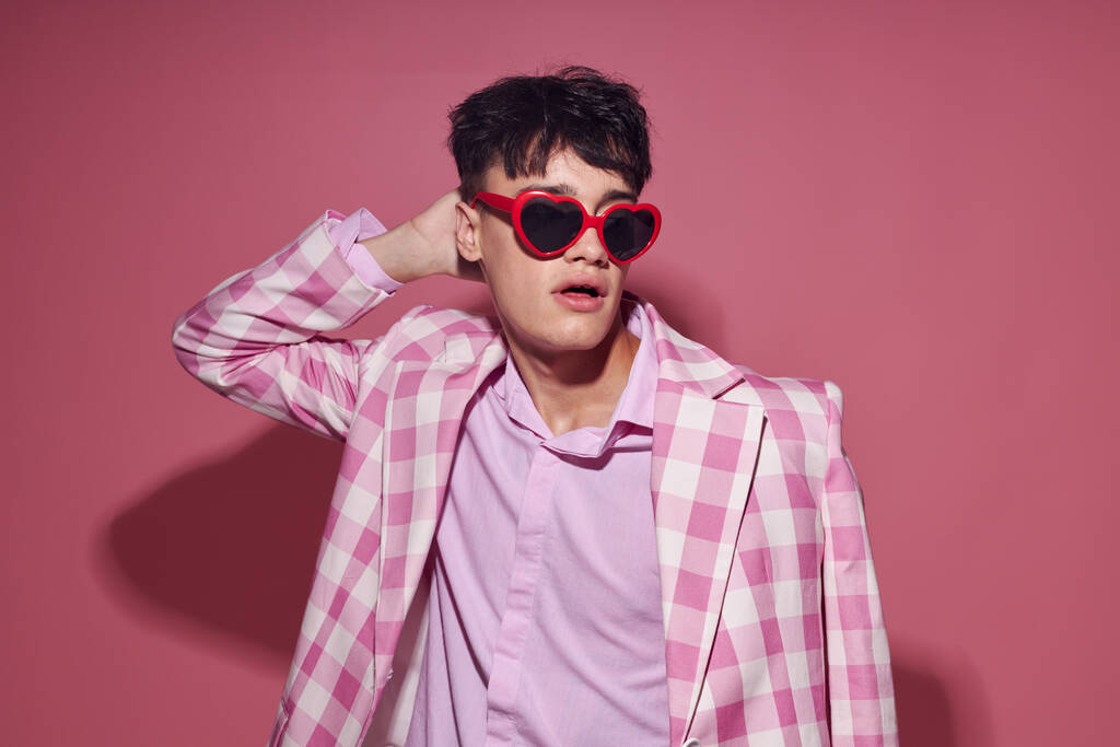 Photo of romantic young boyfriend self confidence pink plaid blazer fashion posing Lifestyle unaltered - Фото, изображение