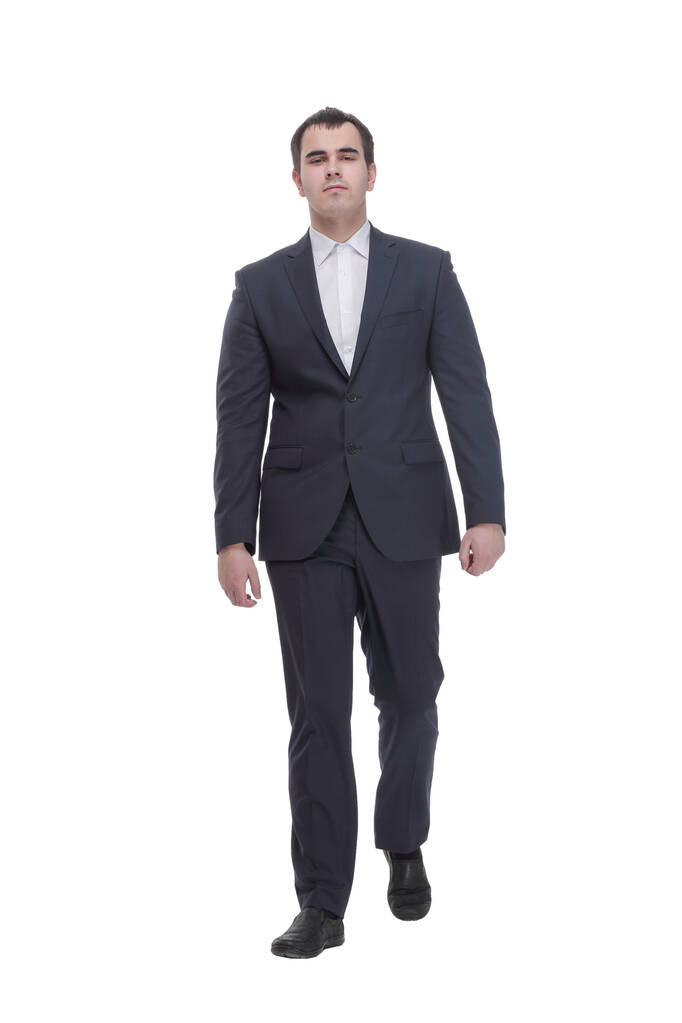 Happy businessman in black suit walking in front of the camera - Foto, Bild