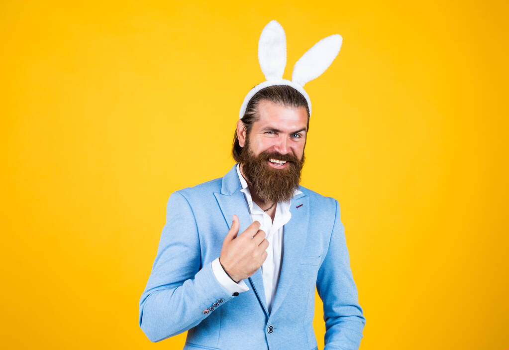 Easter is coming. happy easter. bearded man wear bunny ears. Egg hunt. spring holiday celebration. funny male hipster. brutal man having fun. mature male wear rabbit ears. easter bunny man - Fotografie, Obrázek