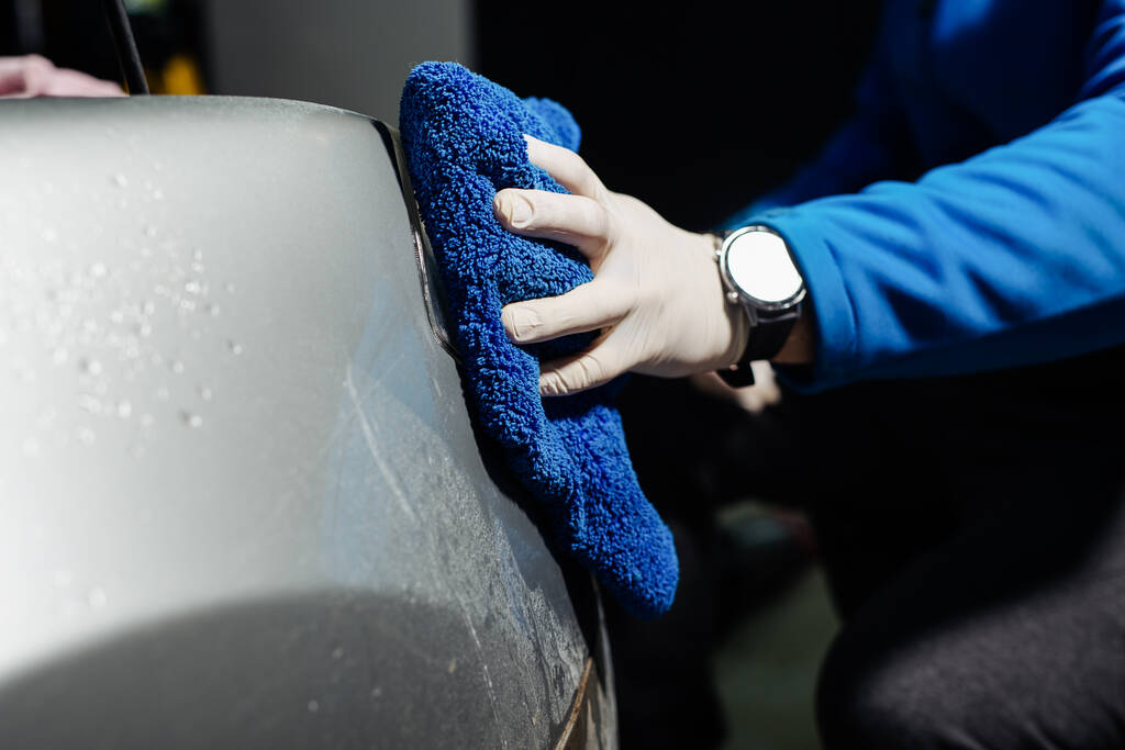Cleaning headlight with microfiber cloth, car lights - Photo, Image