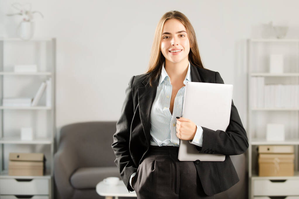 Portrait of young businesswoman accountant in formal wear at office work place. Successful female manager, beautiful secretary girl. - Photo, Image