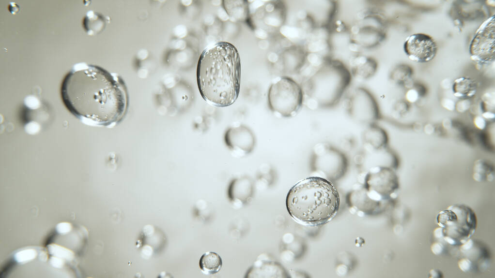 Moving Bubbles on Light Background - Photo, Image