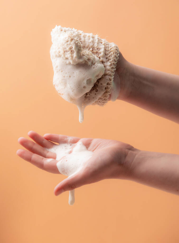 Natural biodegradable washcloth in the female hands - Photo, Image