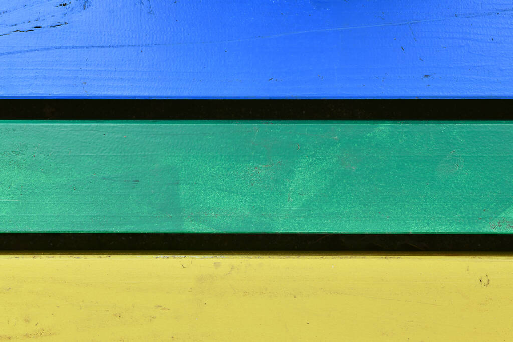 Pannelli di legno multicolore blu, verde e giallo - Foto, immagini