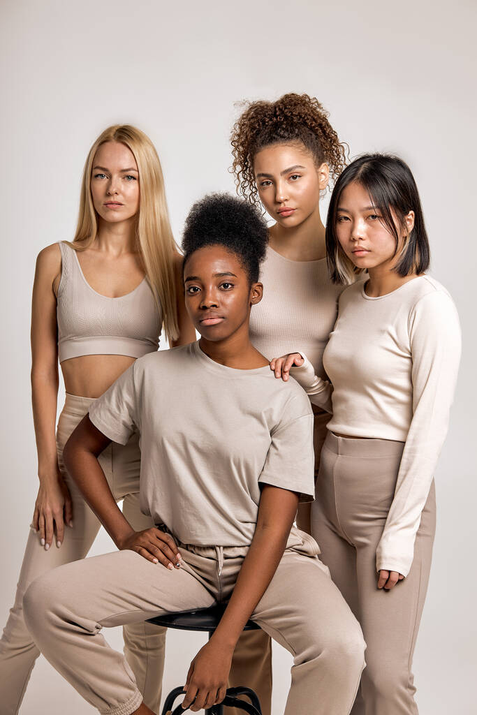 friendship, fashion, diverse and people concept. group of young beautiful different women in casual clothes, natural beauty concept. confident asian, black american, caucasian european females - Foto, immagini