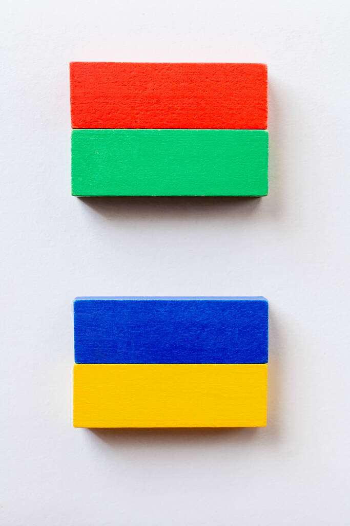top view of rectangles made of colorful blocks on white background - Photo, Image