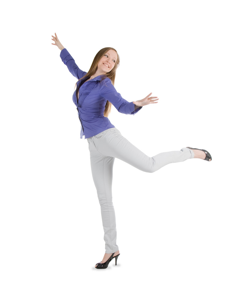 Joven mujer feliz de pie sobre fondo blanco
 - Foto, imagen