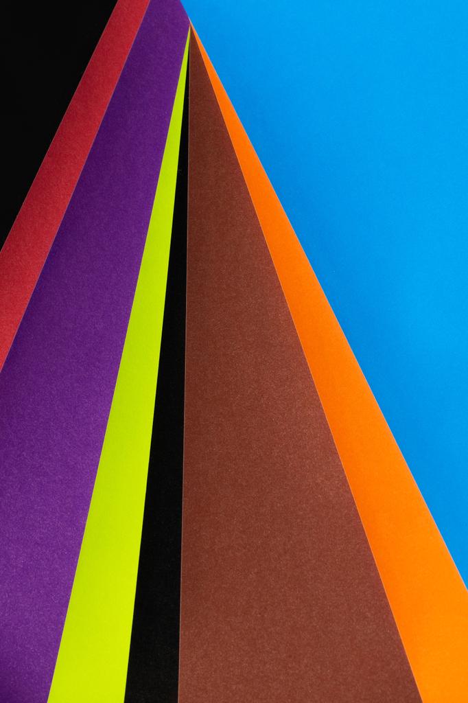 яскравий і різнокольоровий багатокутний смугастий фон
  - Фото, зображення