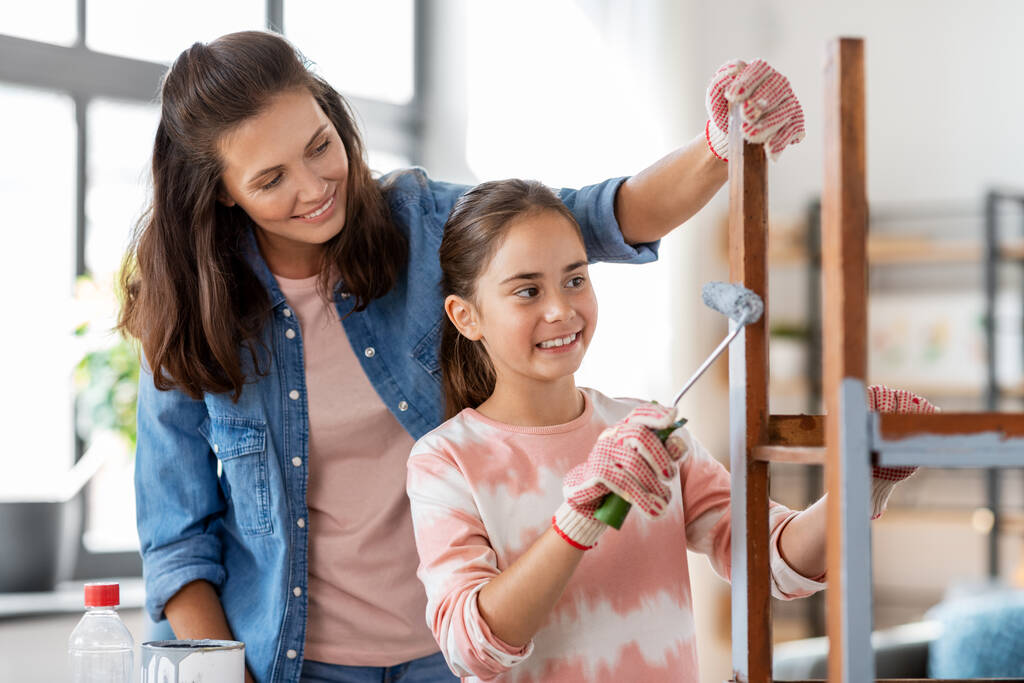 mother and daughter painting old table in grey - Photo, Image