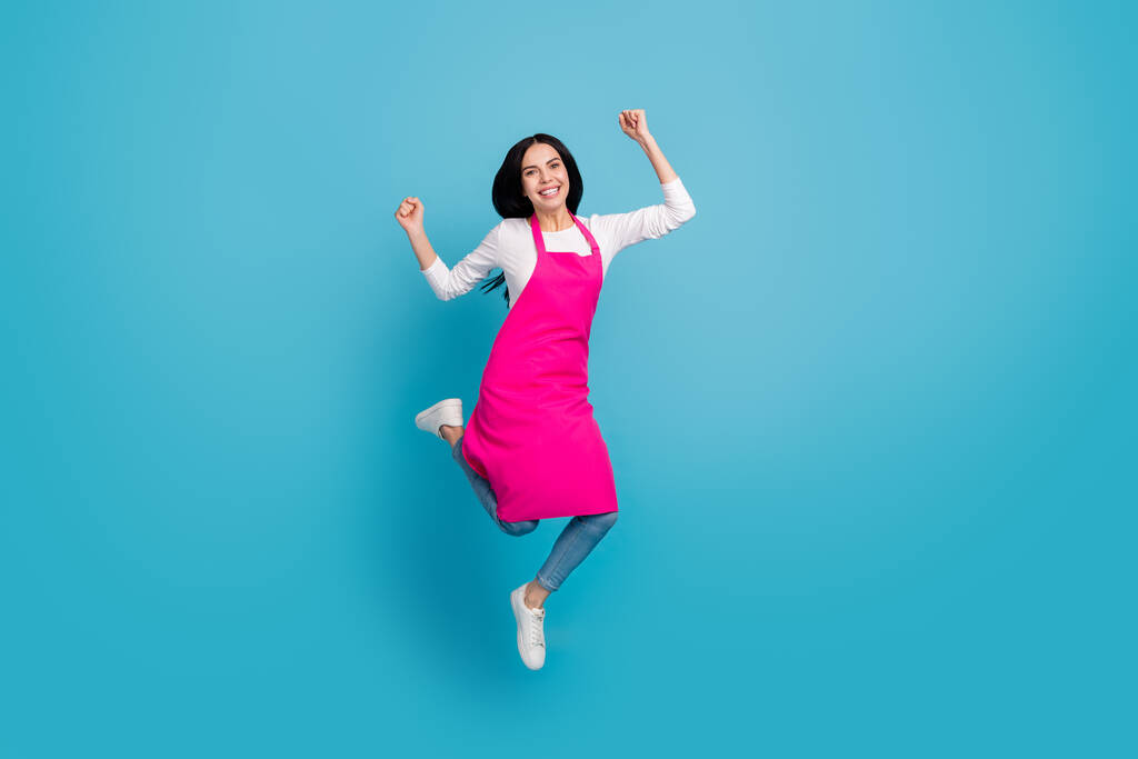 Full length body size view of attractive cheerful girl expert jumping having fun isolated over bright blue color background - Photo, Image