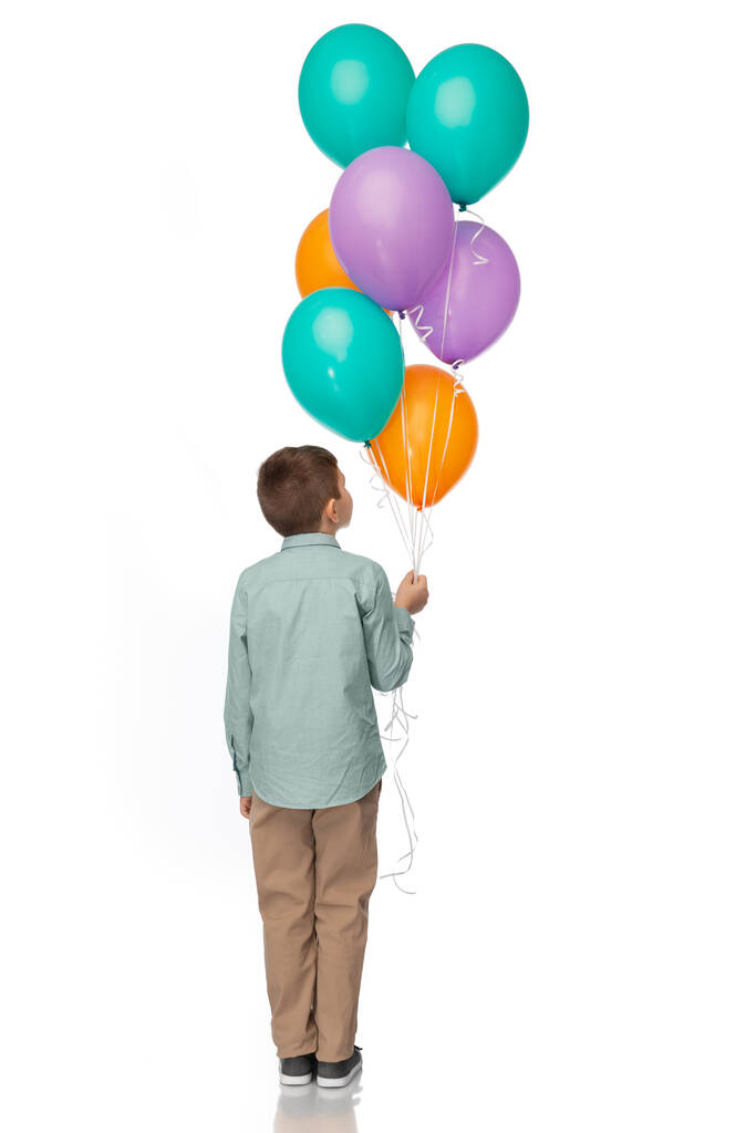 little boy in birthday party hat with balloons - Photo, Image